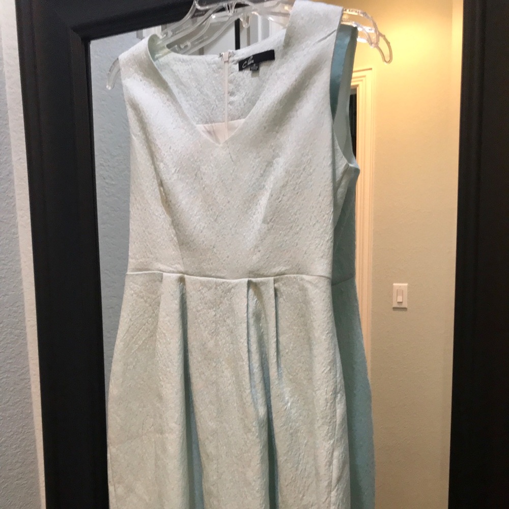 C. Luce short sleeveless v-neck dress